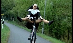 Nun on bike