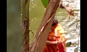 Sexy Bengali boudi soma bathing openly and showing his cardinal